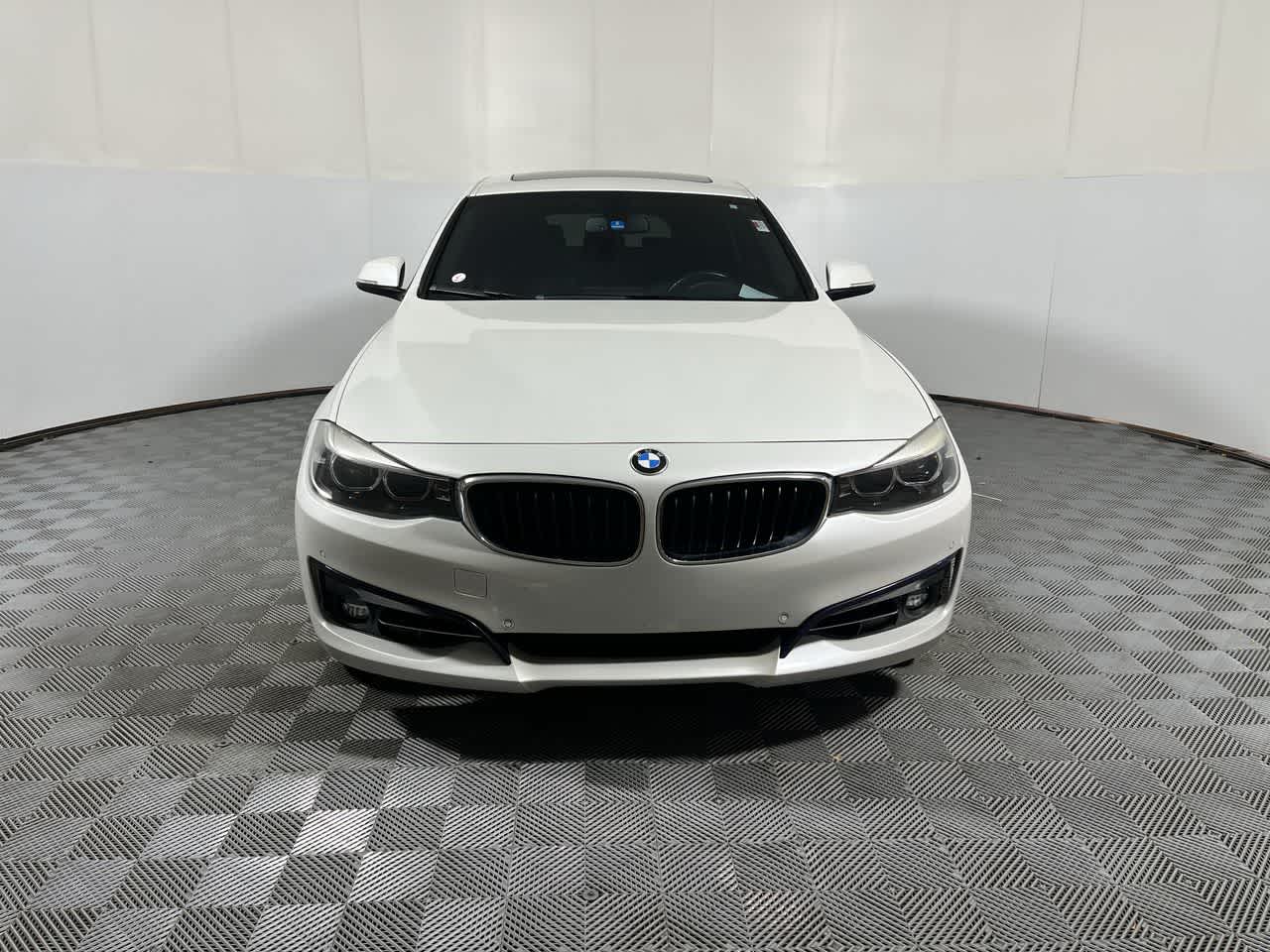 2017 BMW 330i xDrive — rear three-quarter view
