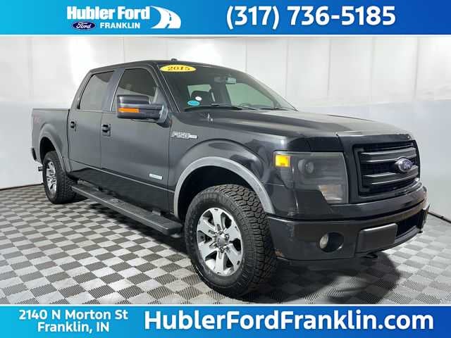 2014 Ford F-150 FX4 in Tuxedo Black Metallic — front three-quarter view