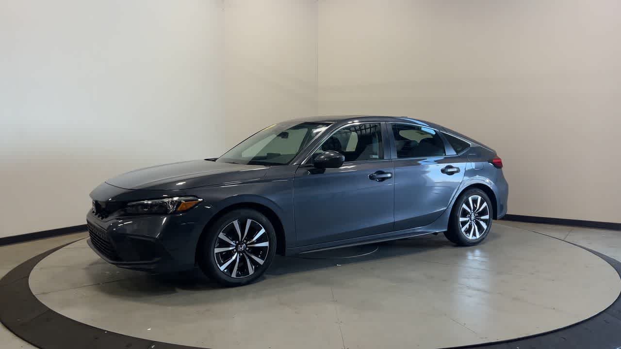 2024 Honda Civic — rear three-quarter view