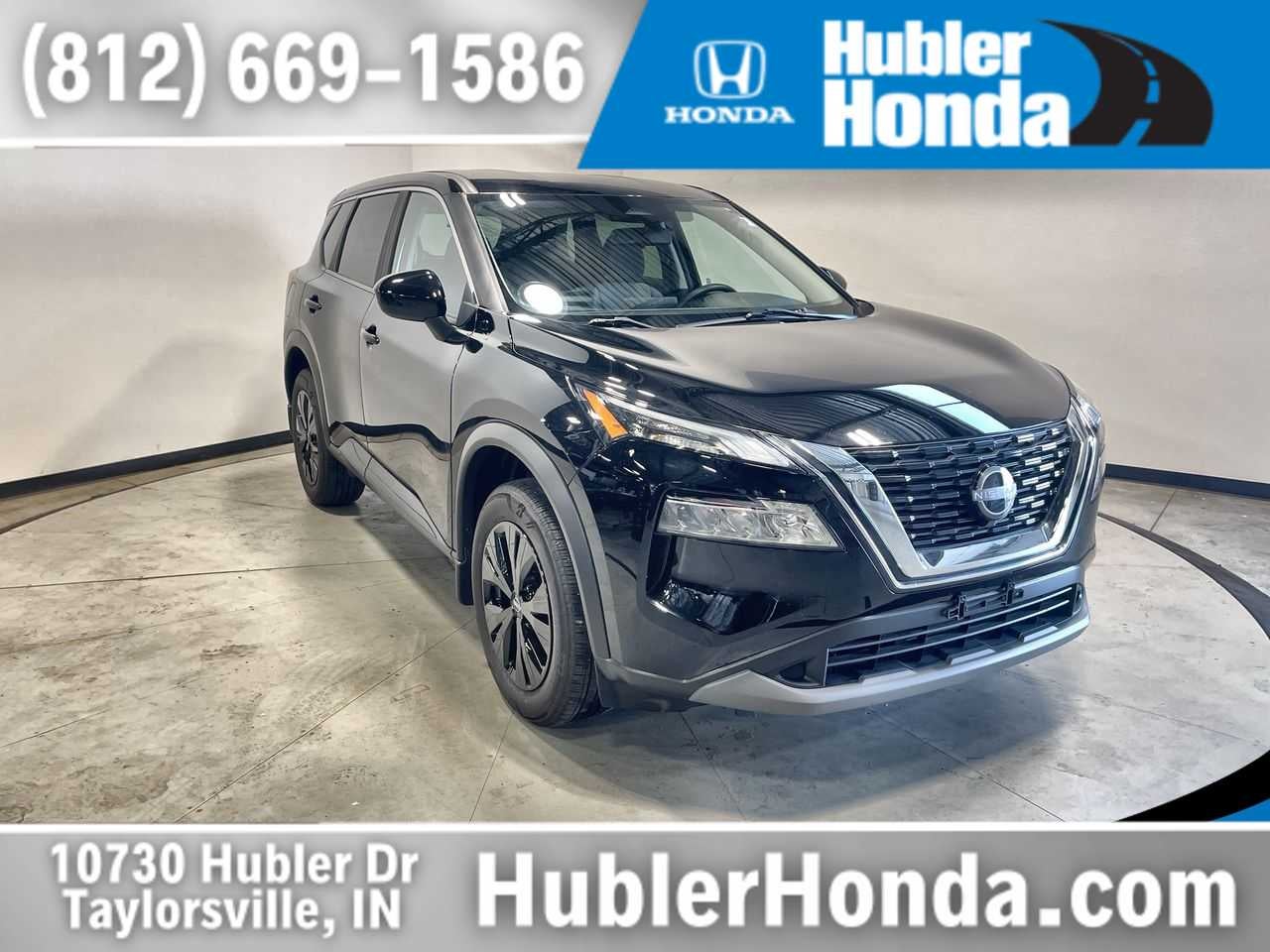 2023 Nissan Rogue SV in Super Black — front three-quarter view