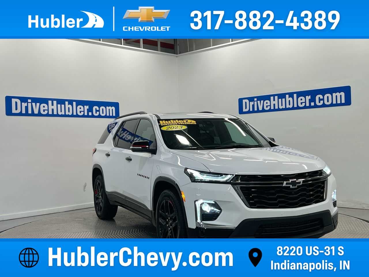 2023 Chevrolet Traverse Premier in Summit White — front three-quarter view