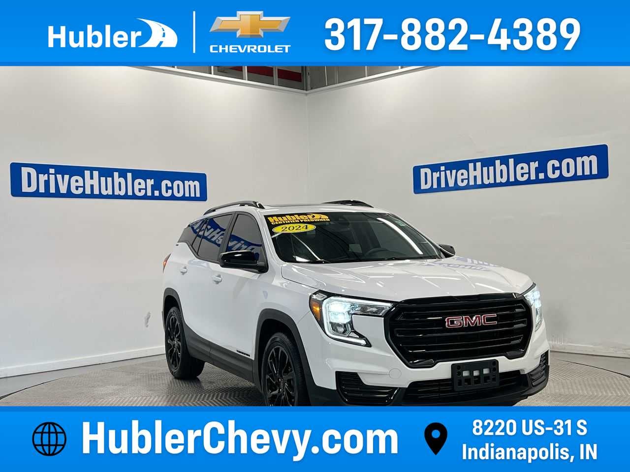 2024 GMC Terrain SLE in Summit White — front three-quarter view
