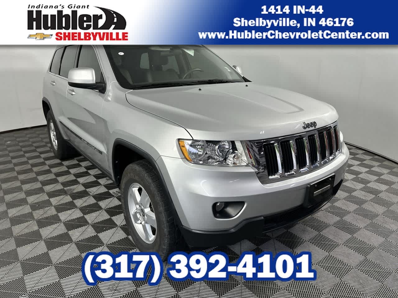 2012 Jeep Grand Cherokee Laredo in Silver — front three-quarter view