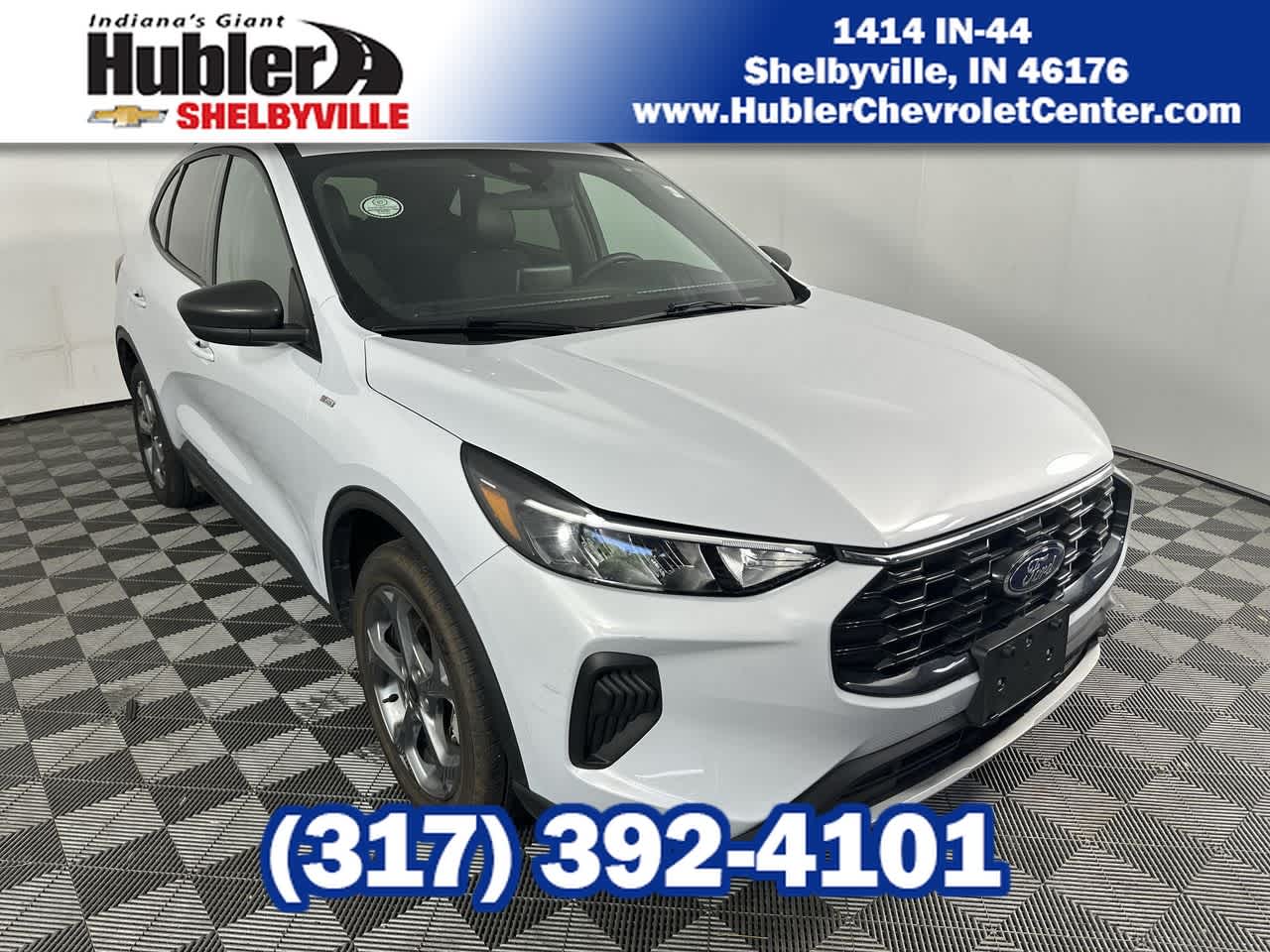 2025 Ford Escape ST-Line in Silver Sky Metallic — front three-quarter view