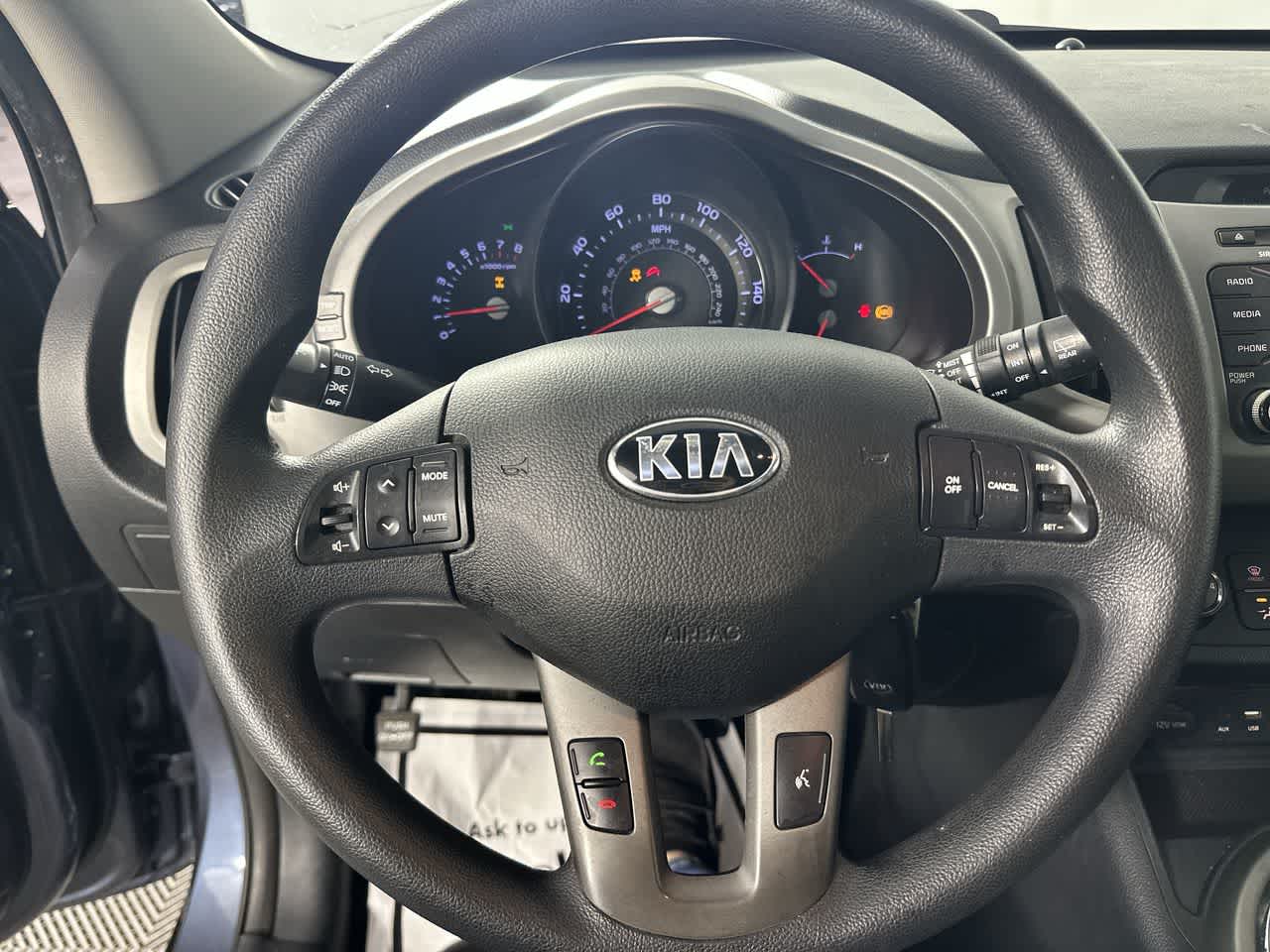 2016 Kia Sportage — rear three-quarter view