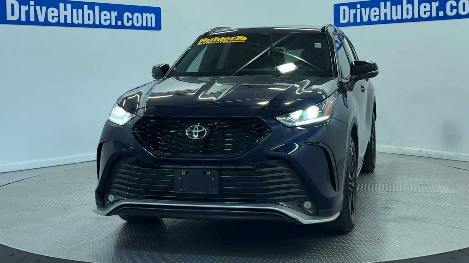 2025 Toyota Highlander — rear three-quarter view