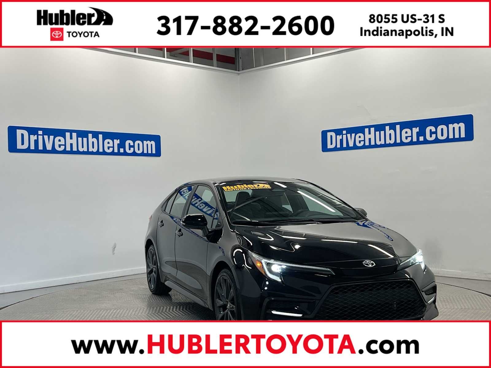 2023 Toyota Corolla SE in Midnight Black Metallic — front three-quarter view