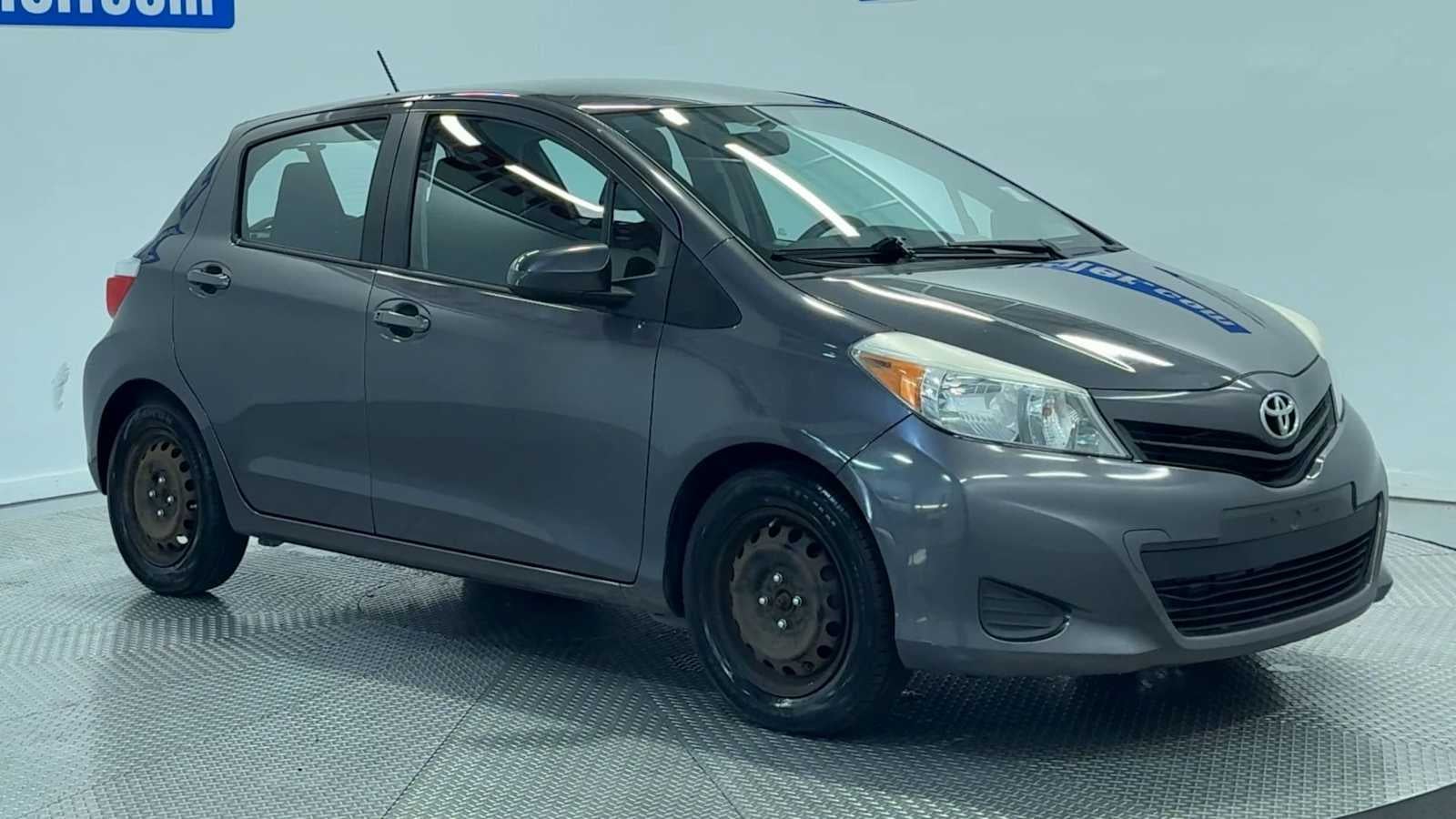 2014 Toyota Yaris — side profile view
