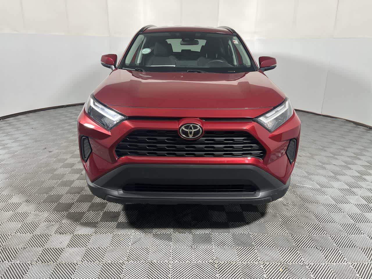 2025 Toyota RAV4 — rear three-quarter view