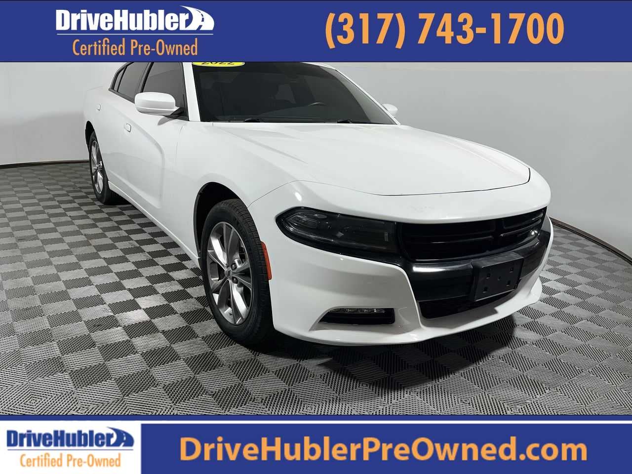 2022 Dodge Charger SXT in White Knuckle Clearcoat — front three-quarter view