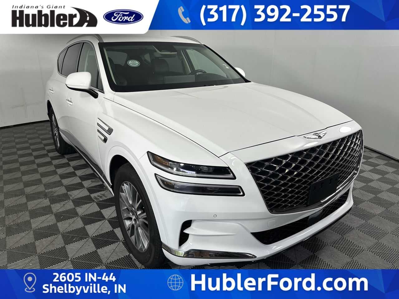 2024 Genesis GV80 2.5T AWD in Alta White — front three-quarter view